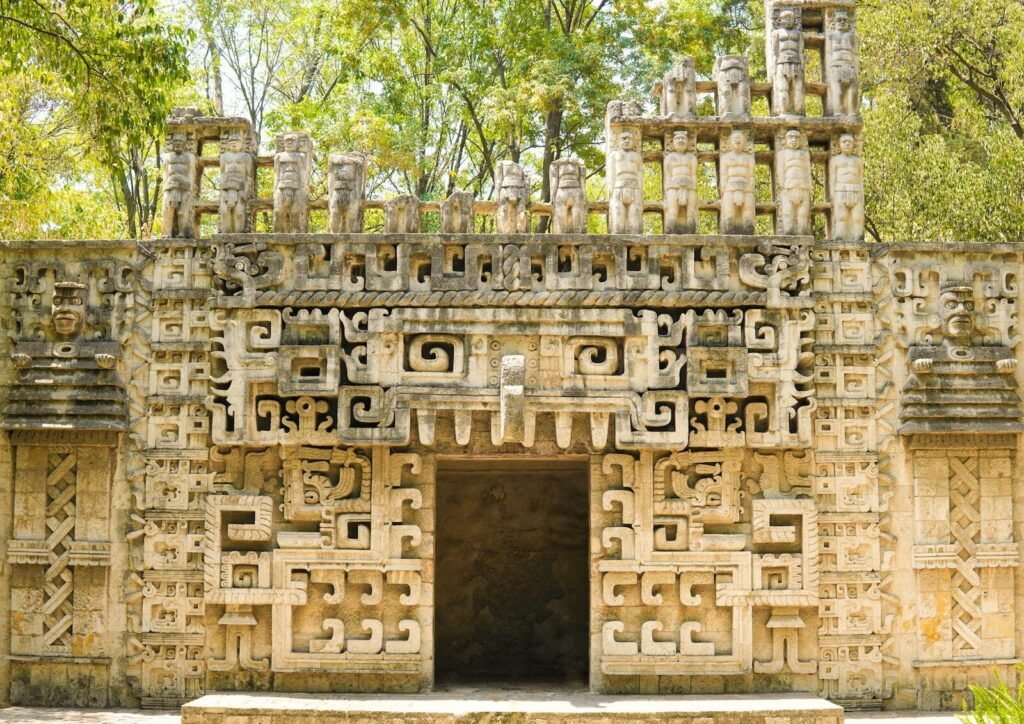 a stone structure with carvings on the front of it